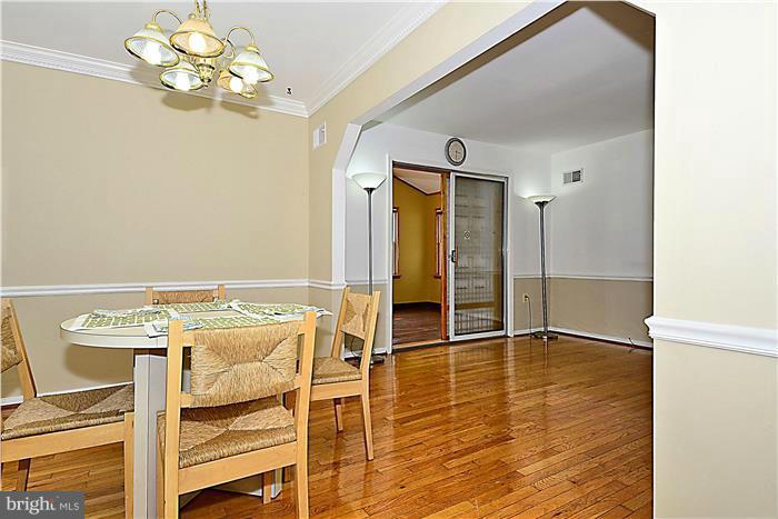 6716 Garrett Road Derwood, MD 20855 - Photo 8 of 30 a view of a livingroom with furniture nad wooden floor