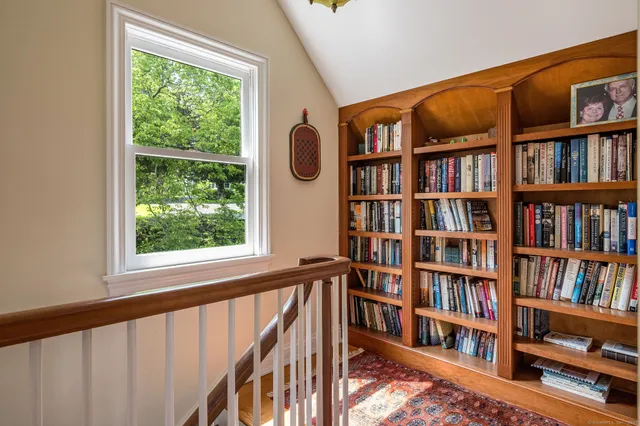 a view of a book shelf with a lots of books