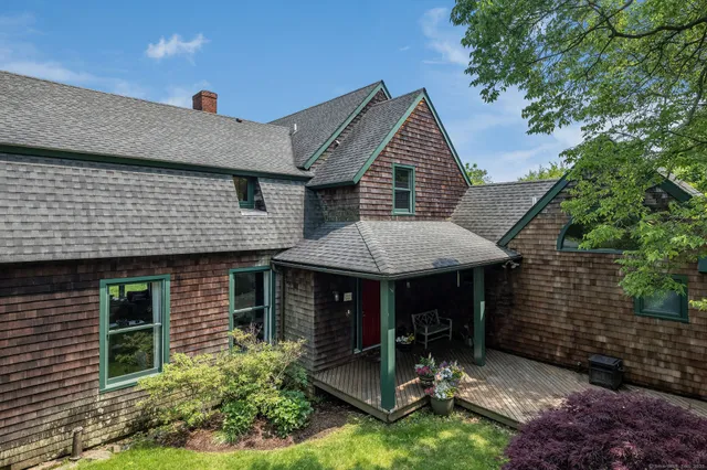 a front view of a house with a porch