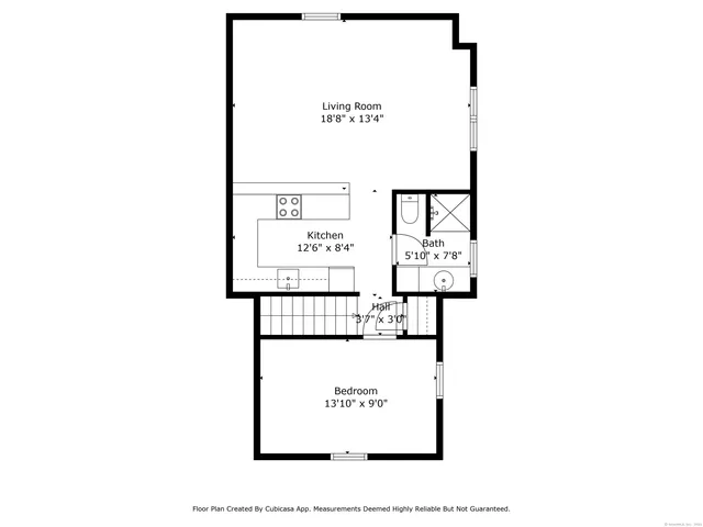 a picture of a bench in front of a white house