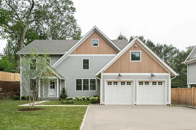 a view of house with garden