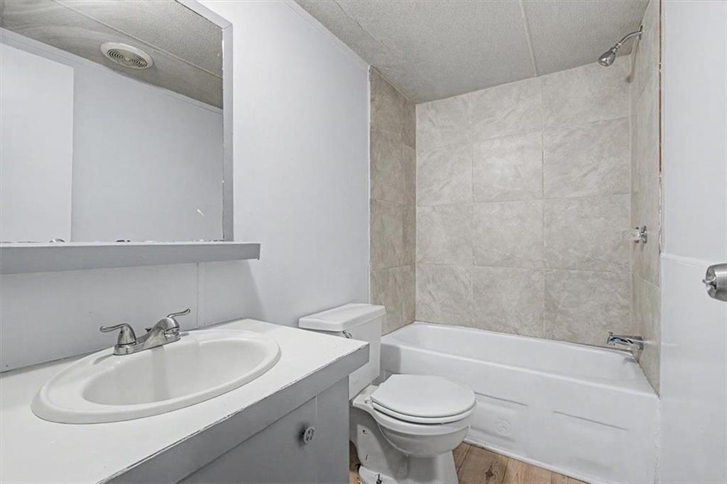 360 Black Knob Church Road Ranger, GA 30734 - Photo 16 of 20 a bathroom with a sink toilet and bathtub
