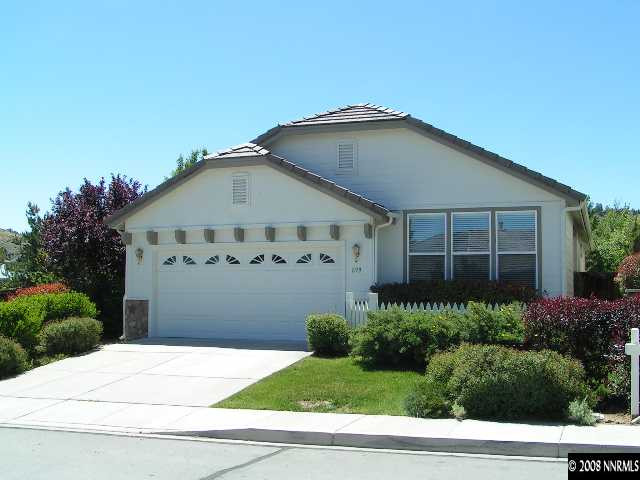 899 Caughlin Glen Reno, NV 89519 - Photo 1 of 9 a front view of a house with garage