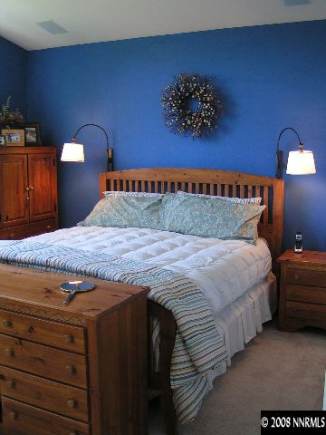899 Caughlin Glen Reno, NV 89519 - Photo 5 of 9 a bedroom with a bed and a night stand