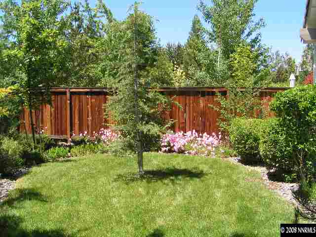 899 Caughlin Glen Reno, NV 89519 - Photo 9 of 9 a view of a backyard with plants and a garden
