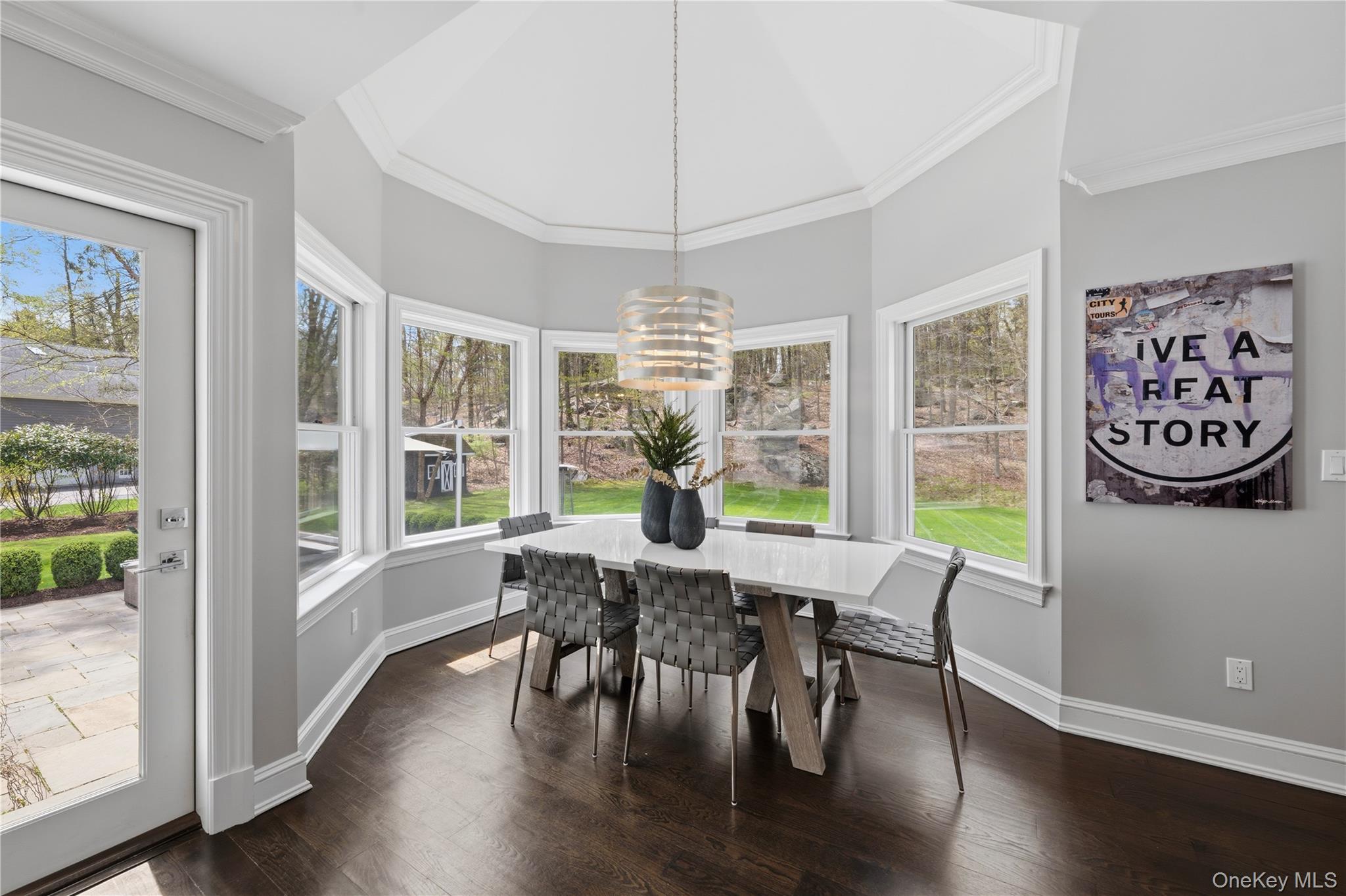 11 Thornewood Road Armonk, NY 10504 - Photo 15 of 35 a view of a dining room with furniture window and wooden floor