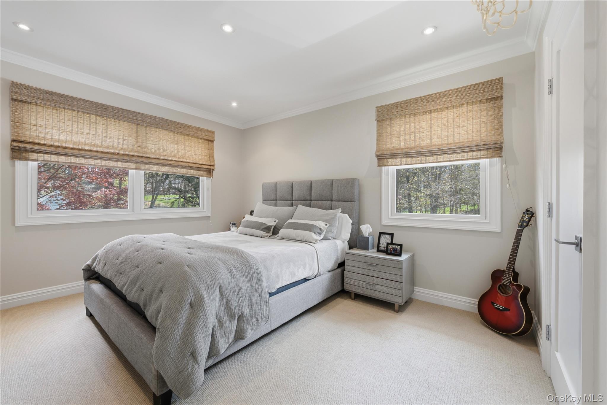 11 Thornewood Road Armonk, NY 10504 - Photo 21 of 35 a bedroom with a bed and a window