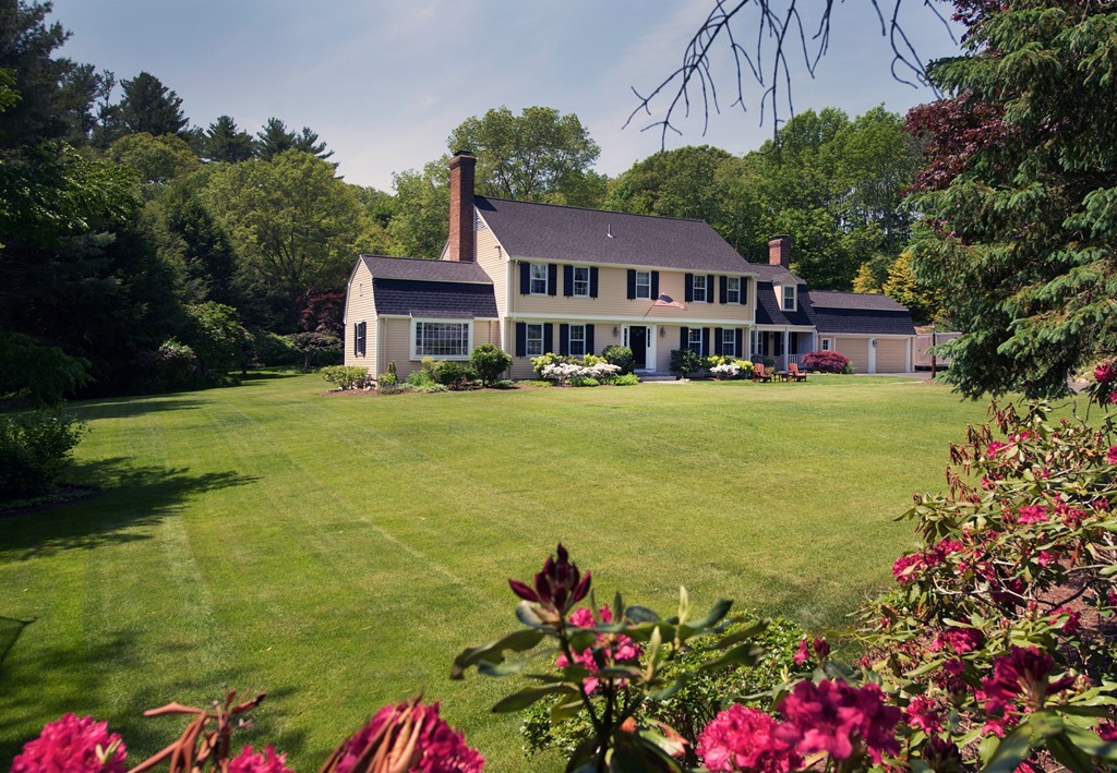 17 Juniper Road Weston, MA 02493 - Photo 3 of 30 a front view of a house with garden