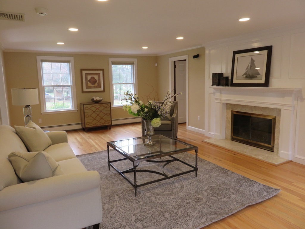 17 Juniper Road Weston, MA 02493 - Photo 6 of 30 a living room with furniture and a fireplace