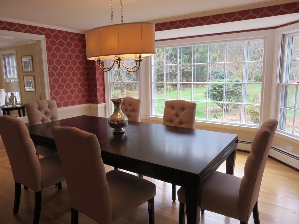 17 Juniper Road Weston, MA 02493 - Photo 7 of 30 a view of a dining room with tables and chairs