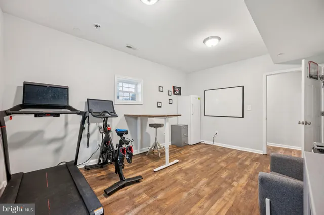a view of a room with gym equipment