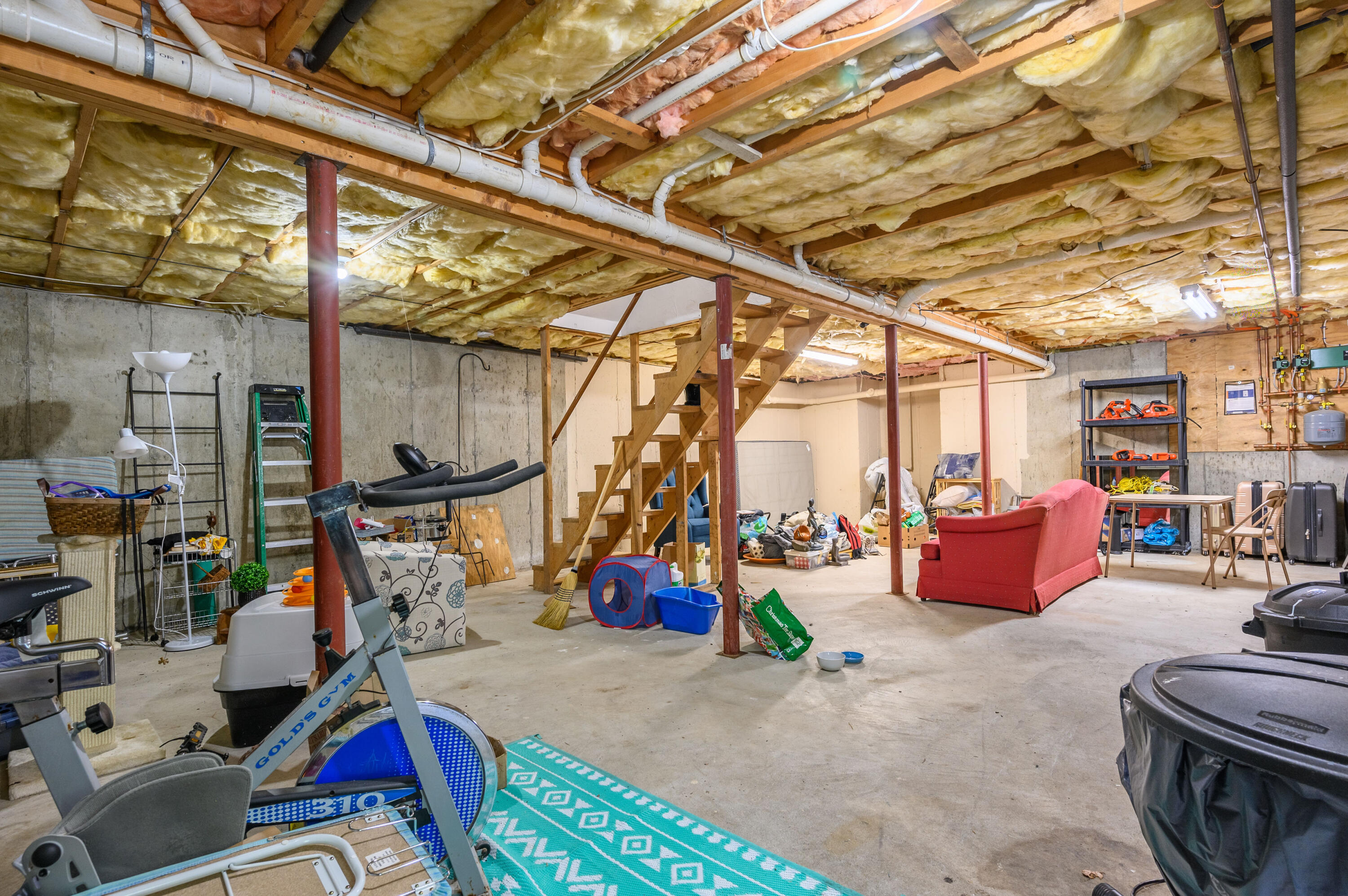 4 Santuit Lane Mashpee, MA 02649 - Photo 34 of 36 a storage room with lots of swings furniture and a rug
