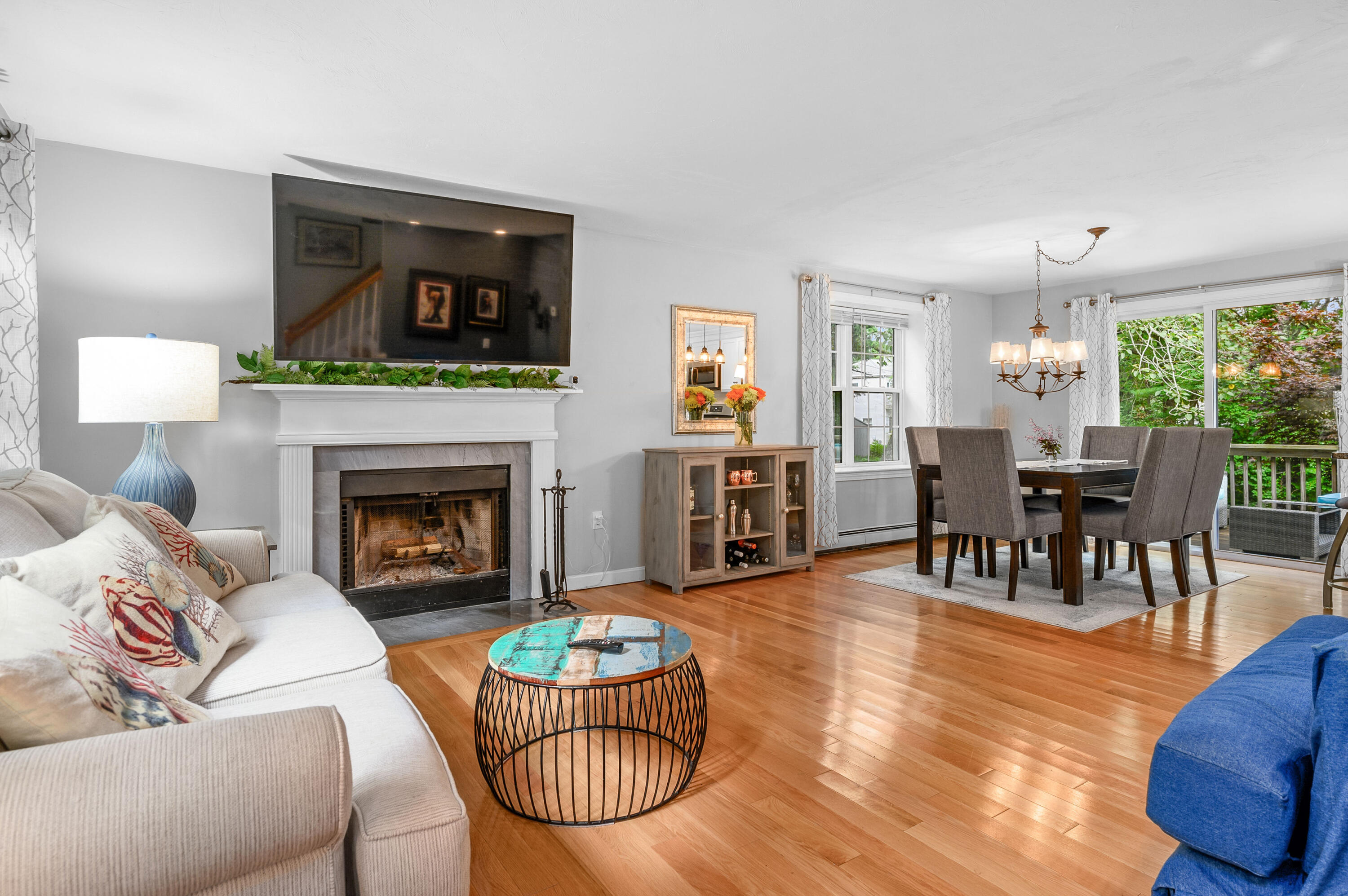 4 Santuit Lane Mashpee, MA 02649 - Photo 9 of 36 a living room with furniture and a fireplace