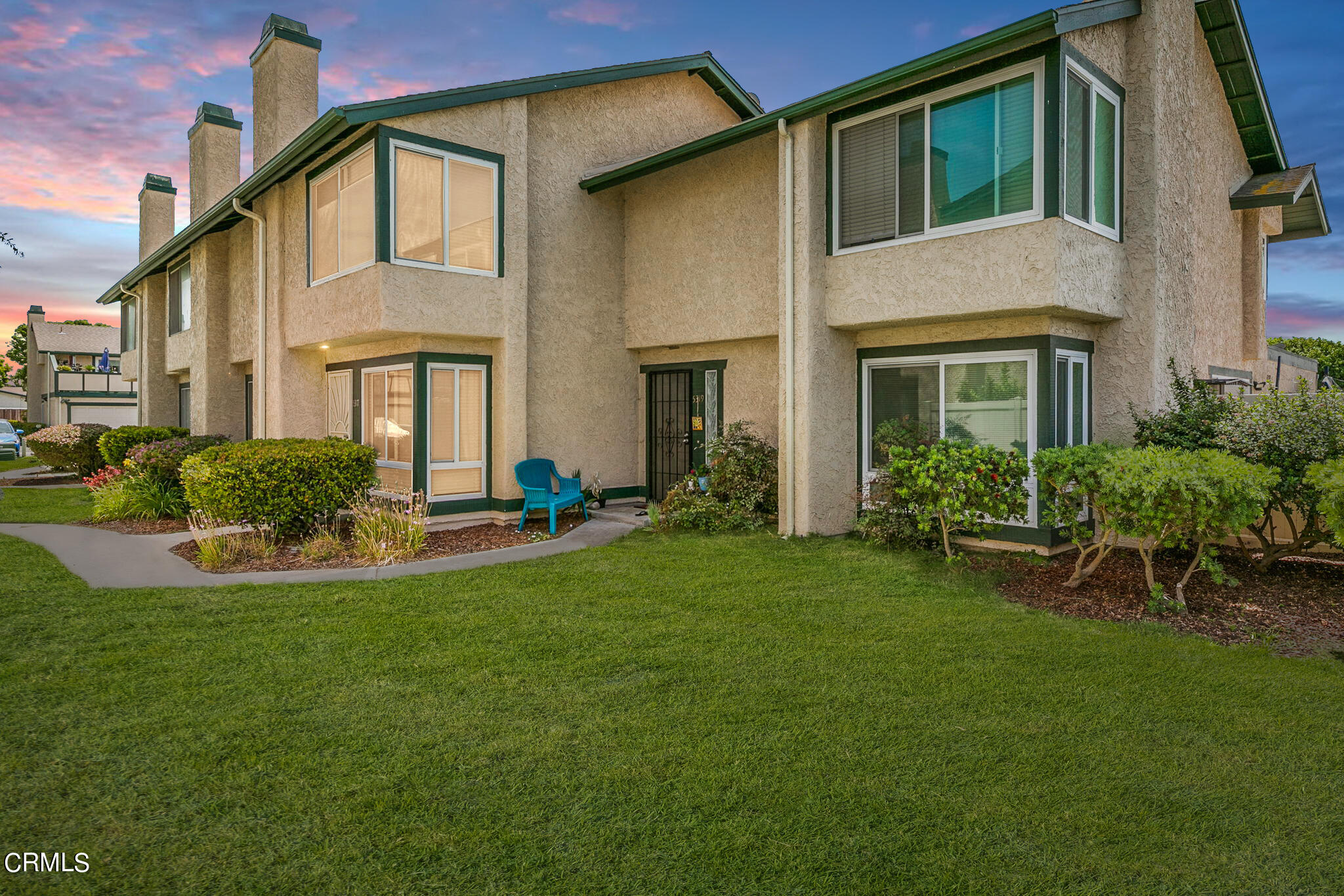 5317 Perkins Road Oxnard, CA 93033 - Photo 1 of 10 a front view of house with yard and outdoor seating