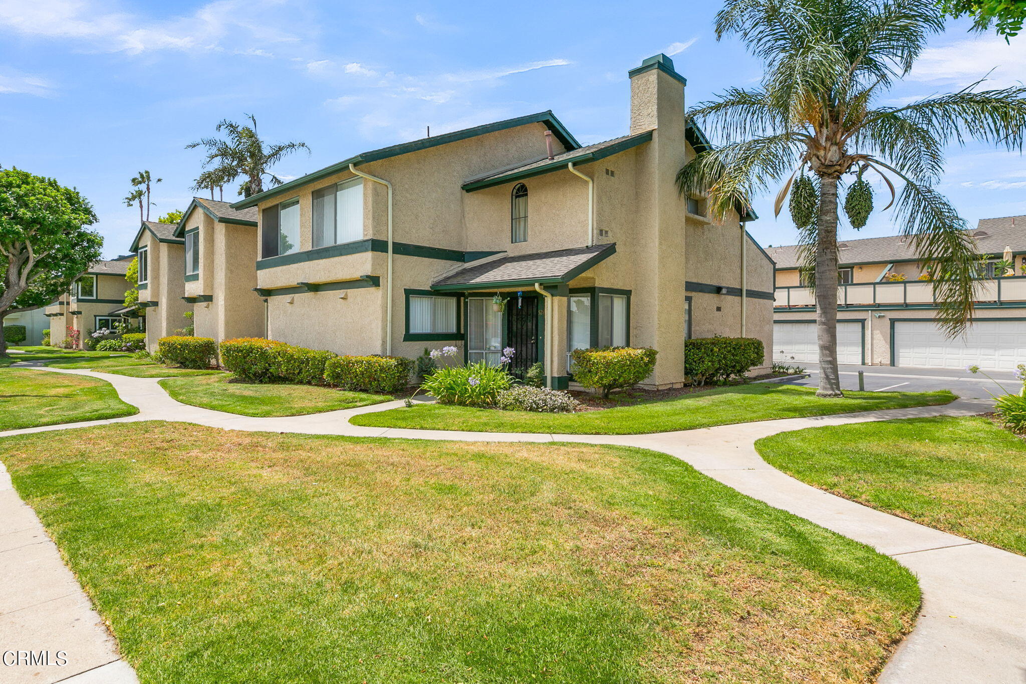 5317 Perkins Road Oxnard, CA 93033 - Photo 3 of 10 a front view of a house with garden