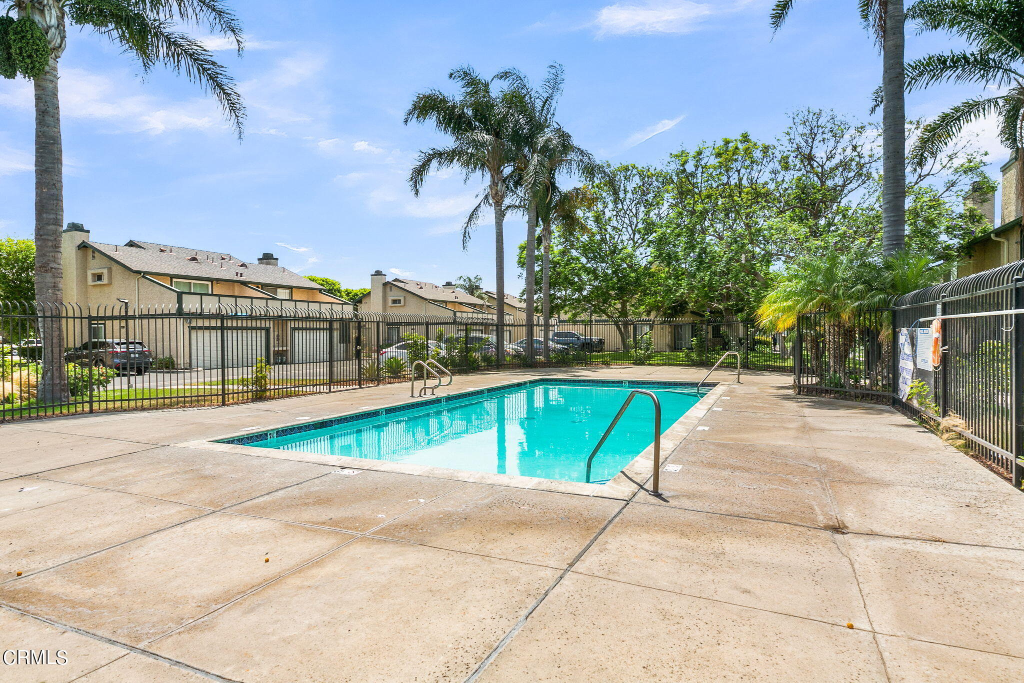 5317 Perkins Road Oxnard, CA 93033 - Photo 9 of 10 a view of a swimming pool with a lounge chairs