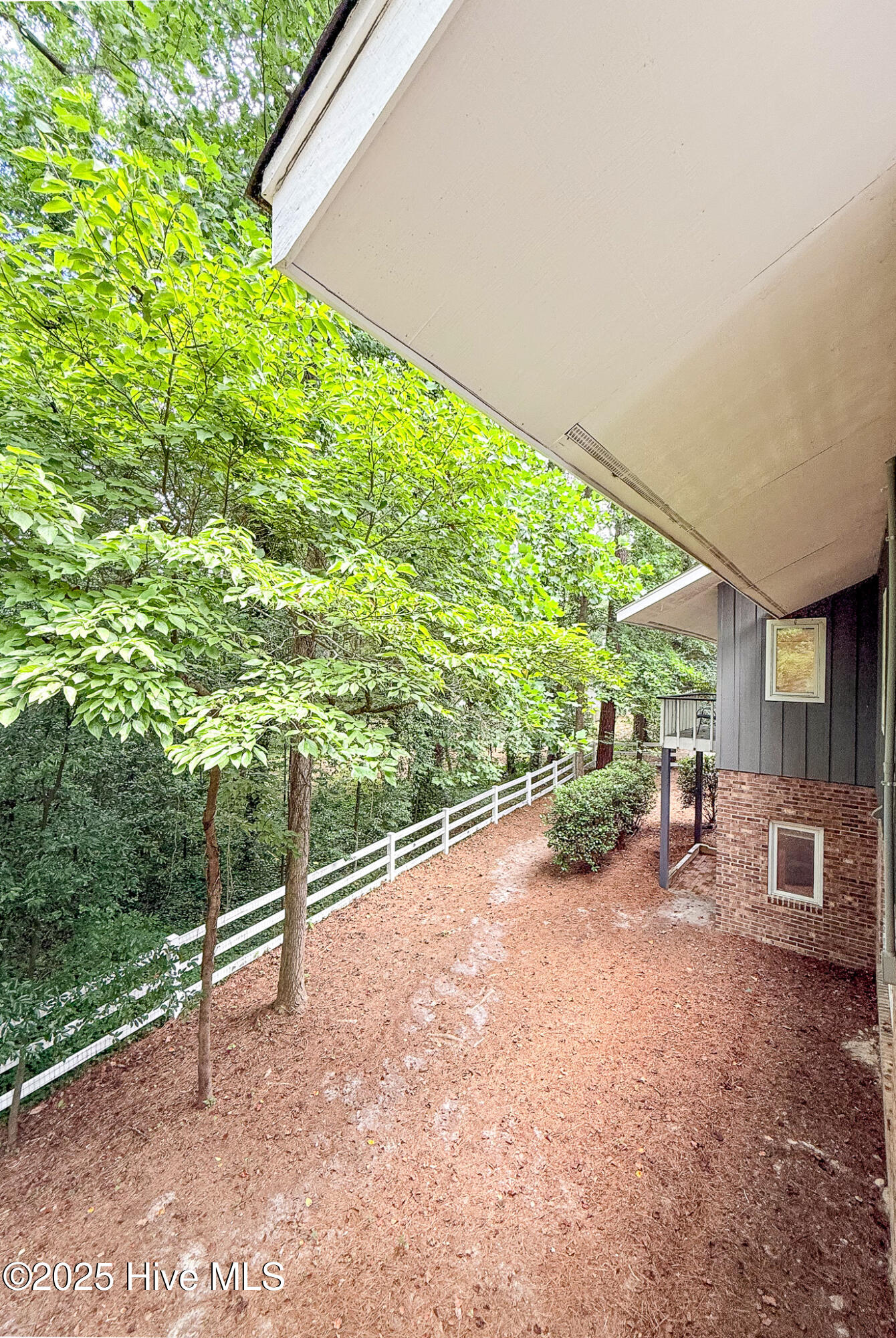 7 Inverness Place Pinehurst, NC 28374 - Photo 20 of 126 View of the back/side of the house from the deck