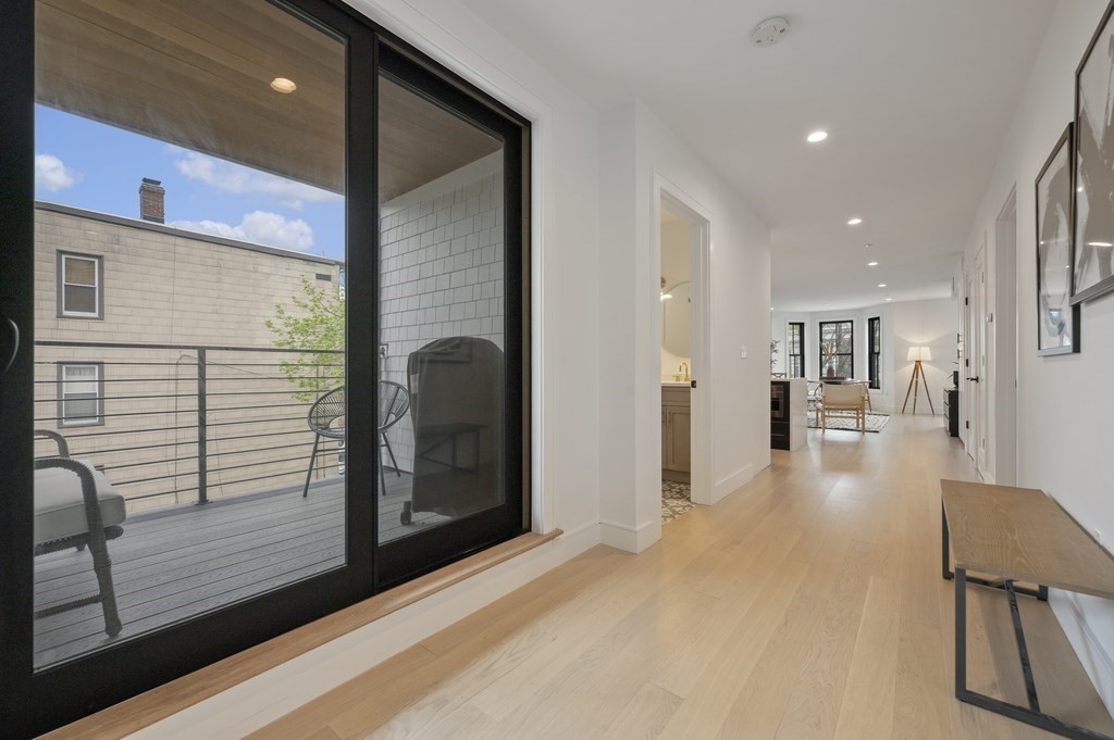 228 Webster Street, Unit 2 Boston, MA 02128 - Photo 25 of 32 a view of a living room with furniture
