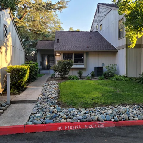 a view of a house with garden