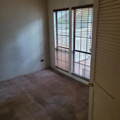 an empty room with closet