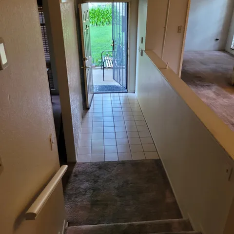 a view of a house with backyard and garden