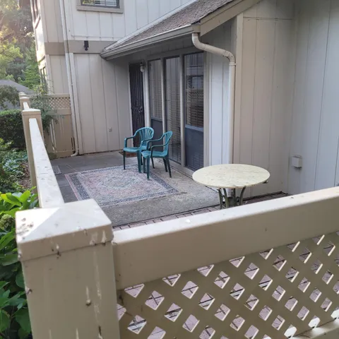 a view of a house with a street
