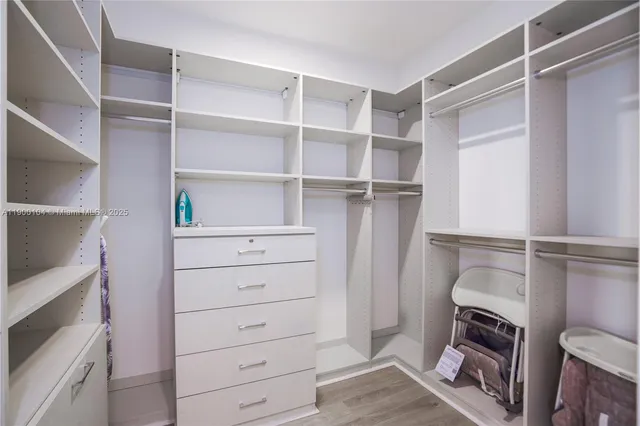 a view of a room with racks on the wall