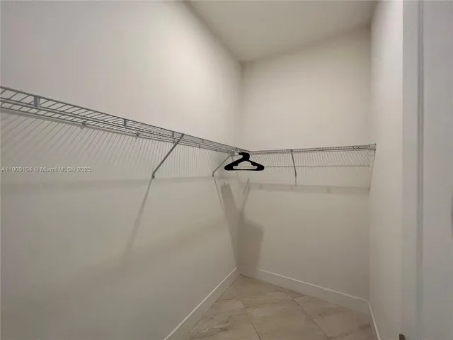 a view of a patio with swimming pool table and chairs