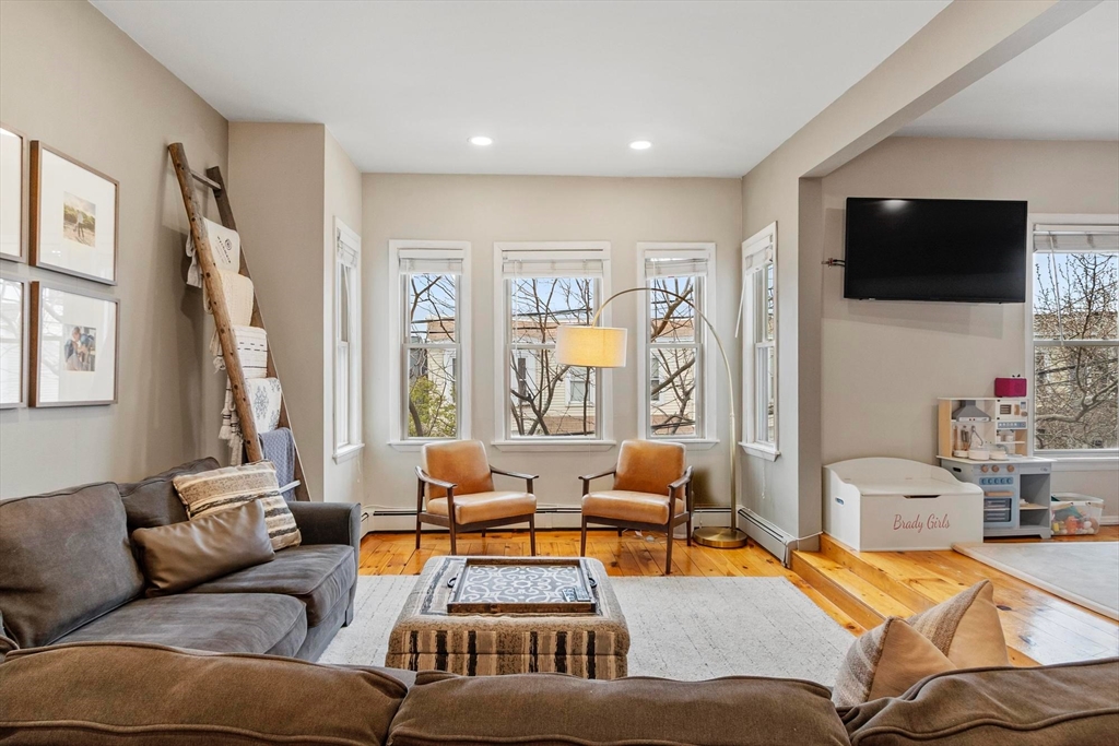 787 East 3rd Street, Unit 2 Boston, MA 02127 - Photo 3 of 15 a living room with furniture and a flat screen tv