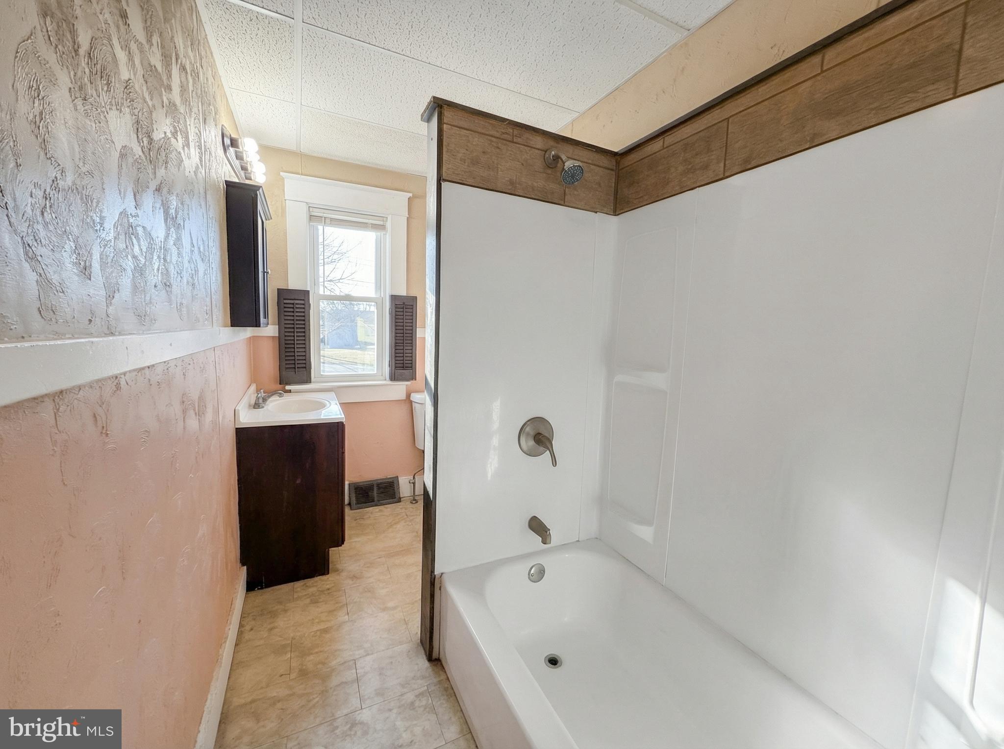 931 East Princess Street York, PA 17403 - Photo 11 of 15 a bathroom with a bathtub and a sink