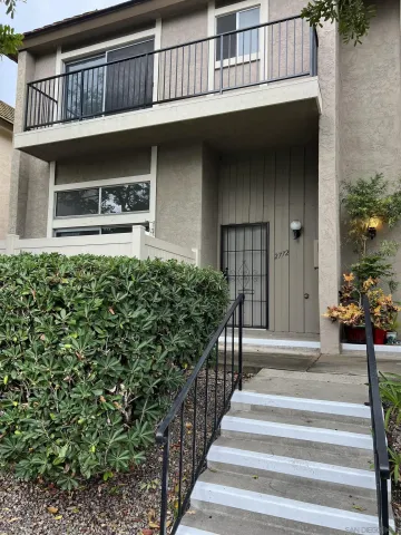 a view of entryway with a front door