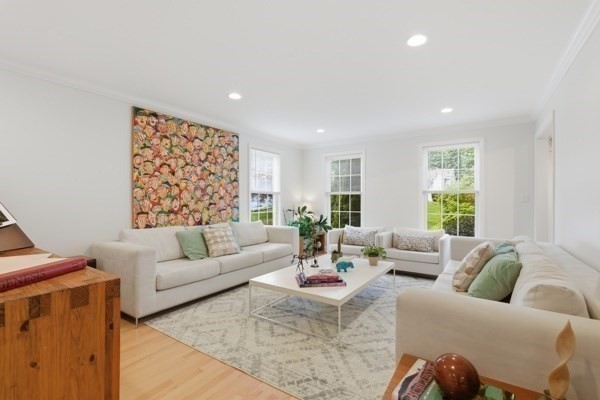 3 Wing Road Wilmington, MA 01887 - Photo 12 of 36 a living room with furniture and a large window