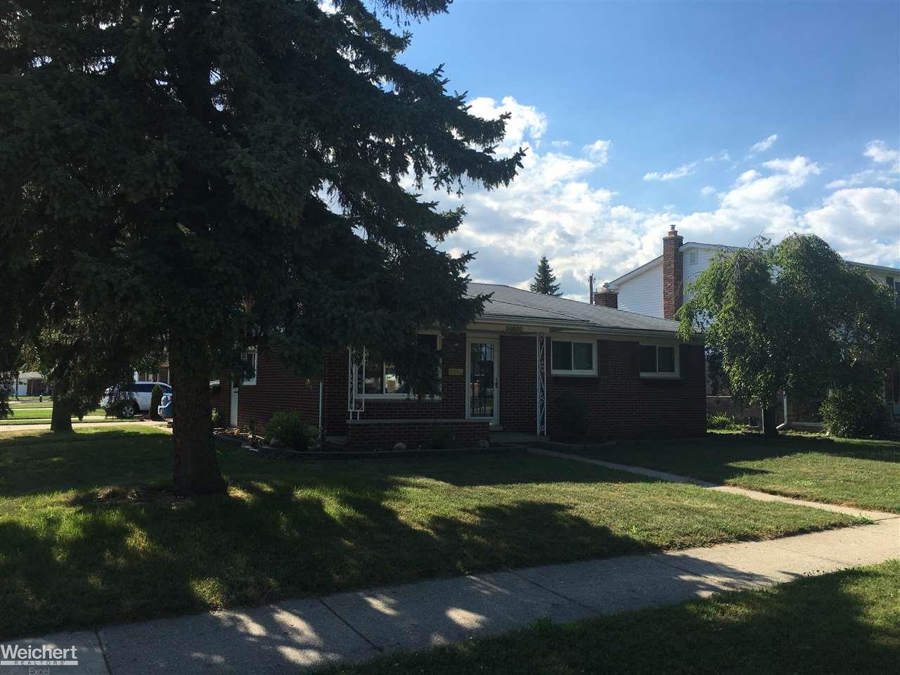 30505 Hayes Road Warren, MI 48088 - Photo 2 of 33 Spacious front yard that is shaded by developed trees