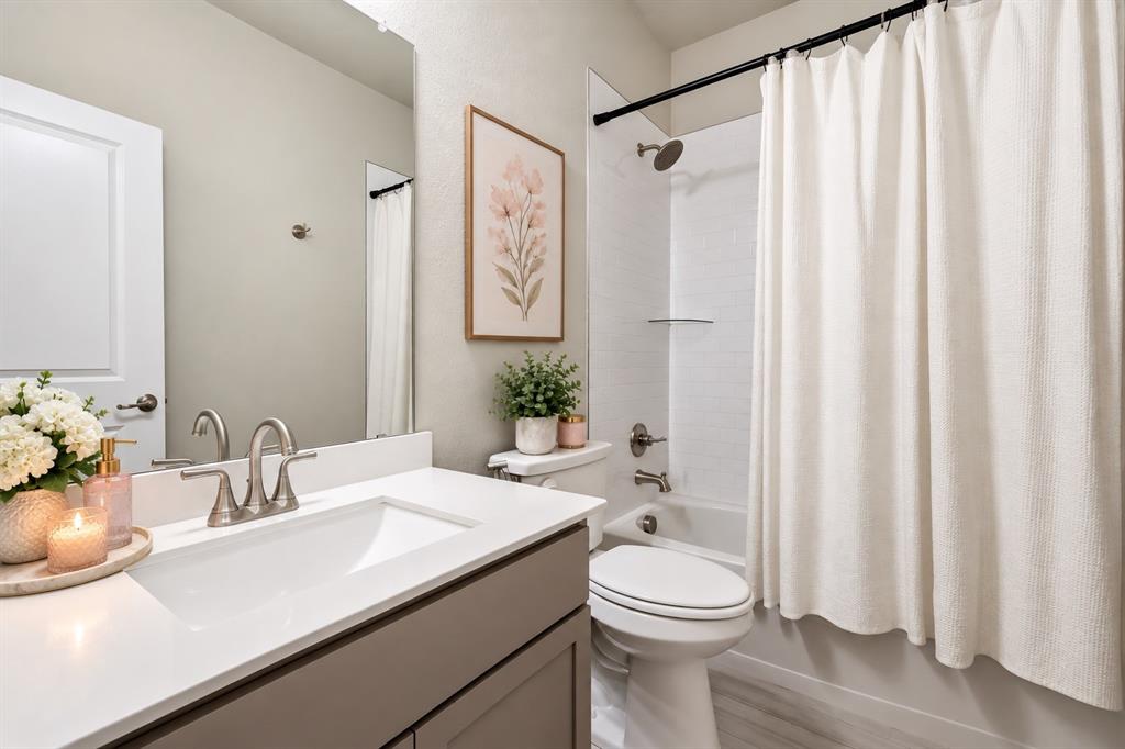 5112 Holy Springs Road Denton, TX 76207 - Photo 5 of 24 Secondary Bathroom with Bidet. Some Photos May Contain Virtual Enhancements or Staging and May Not Represent Furnishings Currently Present In The Home.