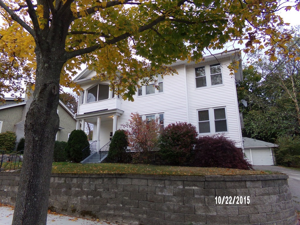 7 Dellwood Road Worcester, MA 01602 - Photo 3 of 19 a front view of a house with garden