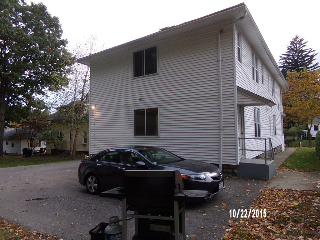 7 Dellwood Road Worcester, MA 01602 - Photo 6 of 19 a car parked in front of a house