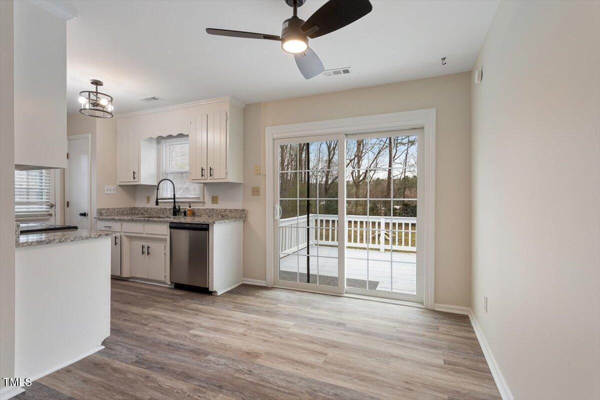 5144 Shield Circle Raleigh, NC 27603 - Photo 13 of 41 a kitchen with stove and cabinets