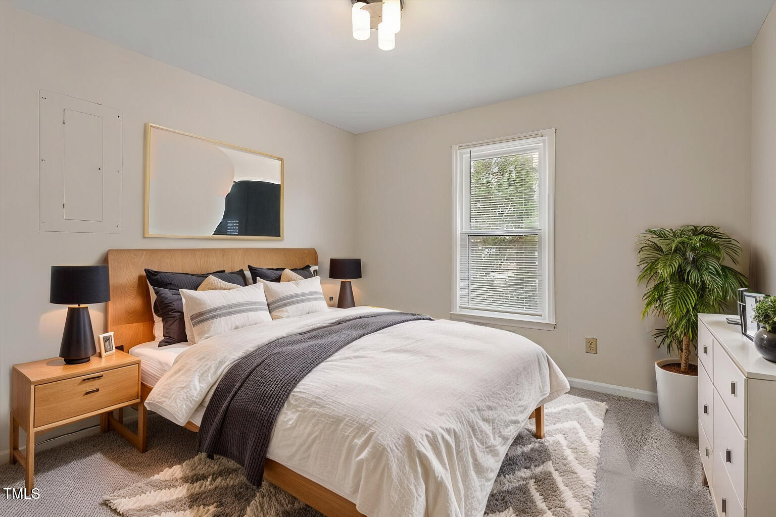 5144 Shield Circle Raleigh, NC 27603 - Photo 25 of 41 a bedroom with a bed and a window