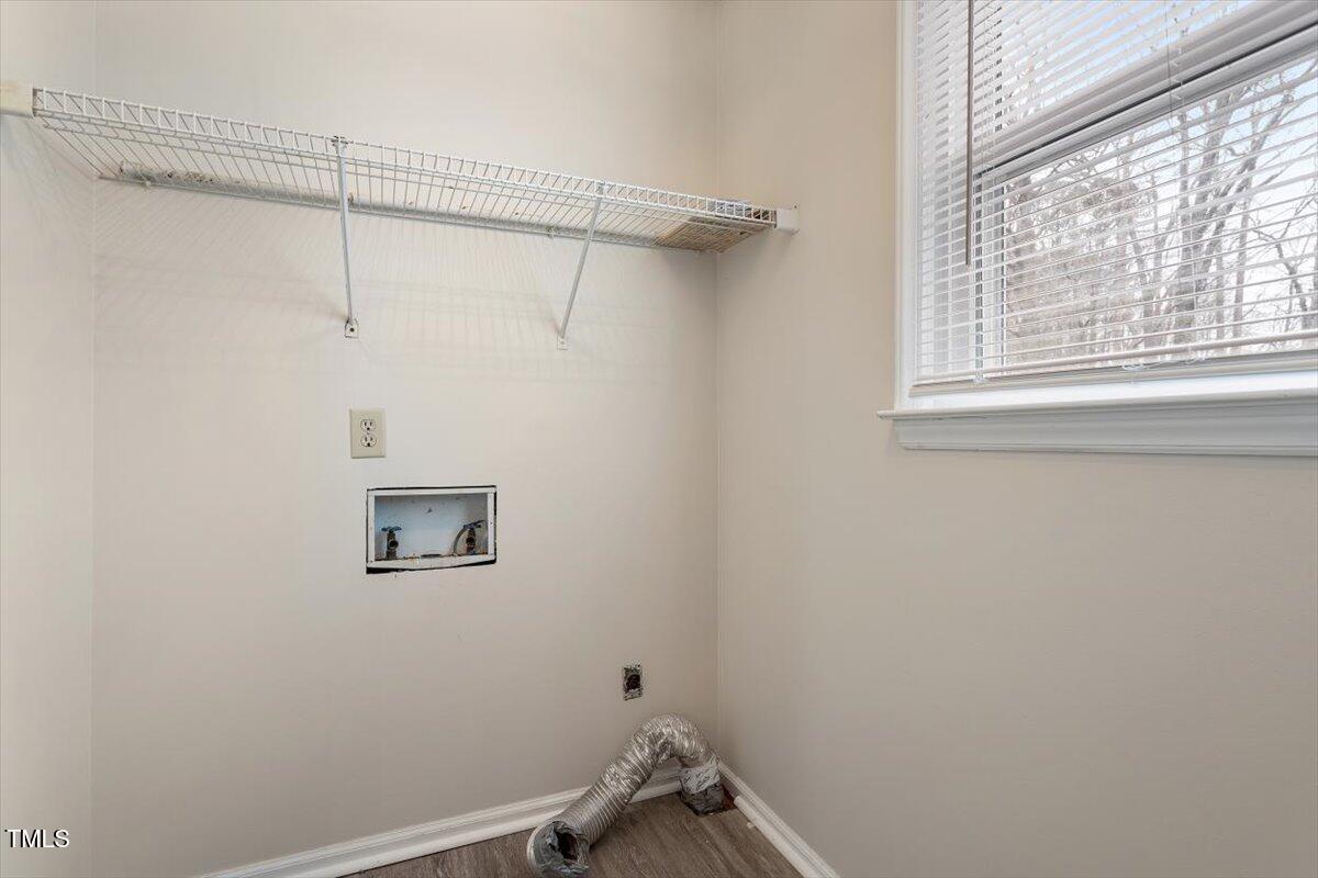 5144 Shield Circle Raleigh, NC 27603 - Photo 31 of 41 a small space with a window and a shower