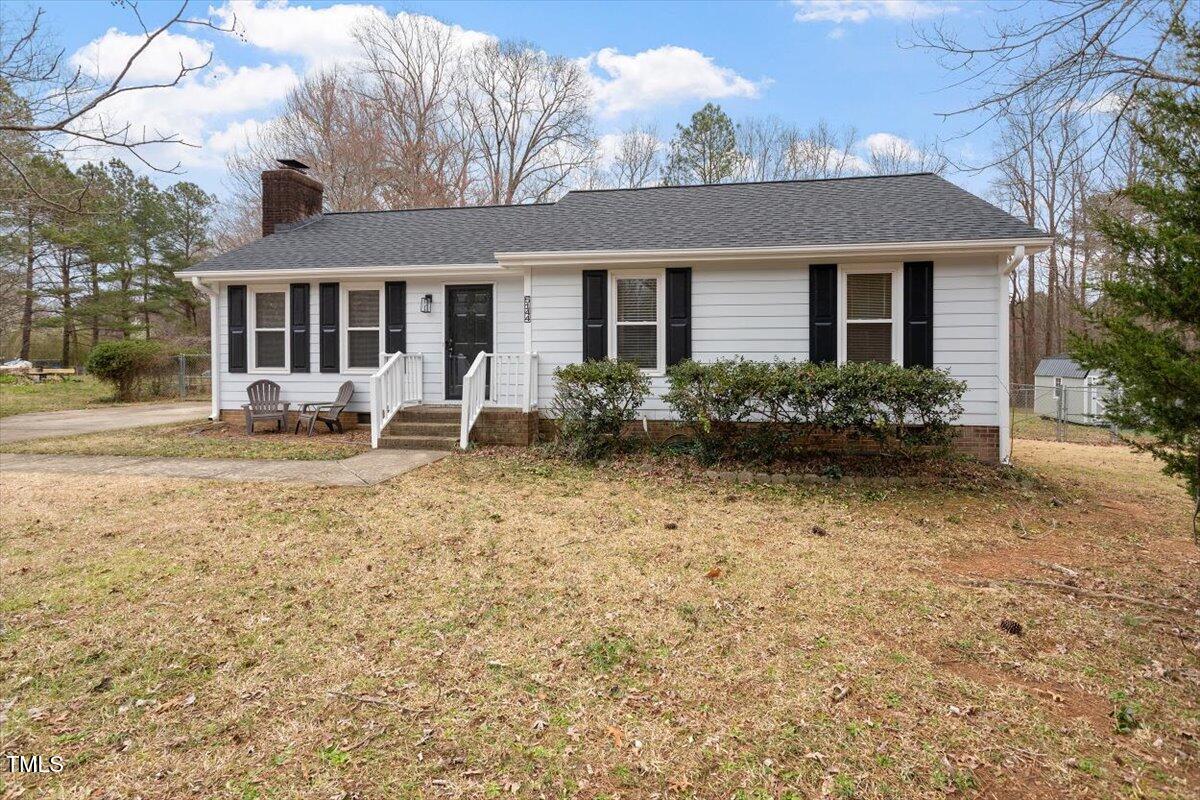 5144 Shield Circle Raleigh, NC 27603 - Photo 40 of 41 a front view of house with yard outdoor seating