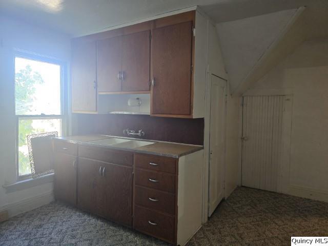 445 Wilcox Street Warsaw, IL 62379 - Photo 16 of 29 a room with a cabinets and window