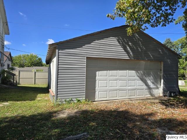 445 Wilcox Street Warsaw, IL 62379 - Photo 24 of 29 a front view of a house with a yard