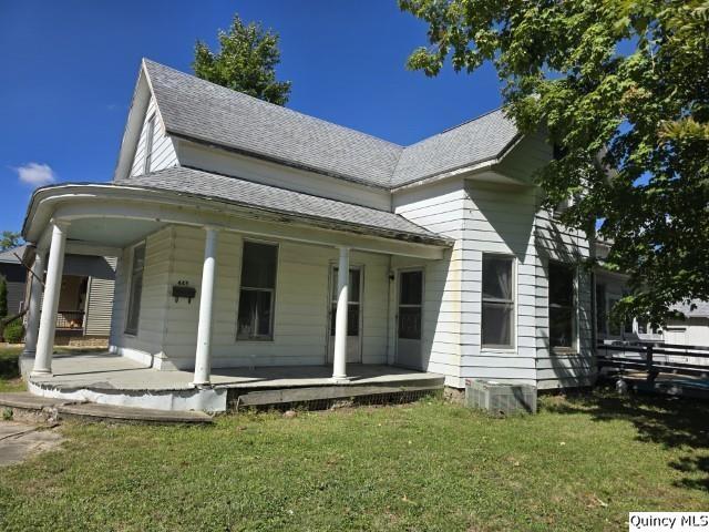445 Wilcox Street Warsaw, IL 62379 - Photo 27 of 29 front view of a house with a yard