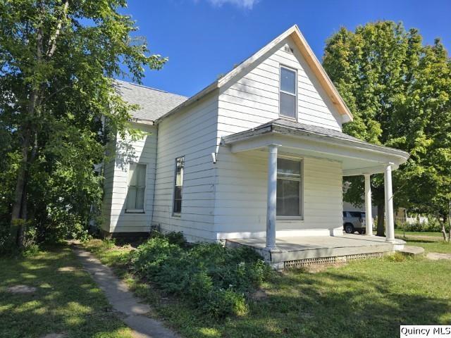 445 Wilcox Street Warsaw, IL 62379 - Photo 28 of 29 a view of a house with backyard