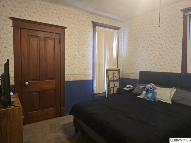 445 Wilcox Street Warsaw, IL 62379 - Photo 8 of 29 a bedroom with a bed and a window