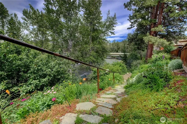 a view of a patio with couches chairs and a table