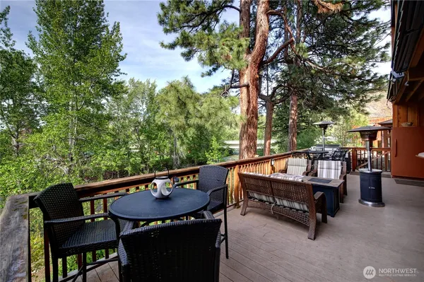 a view of a balcony with chairs