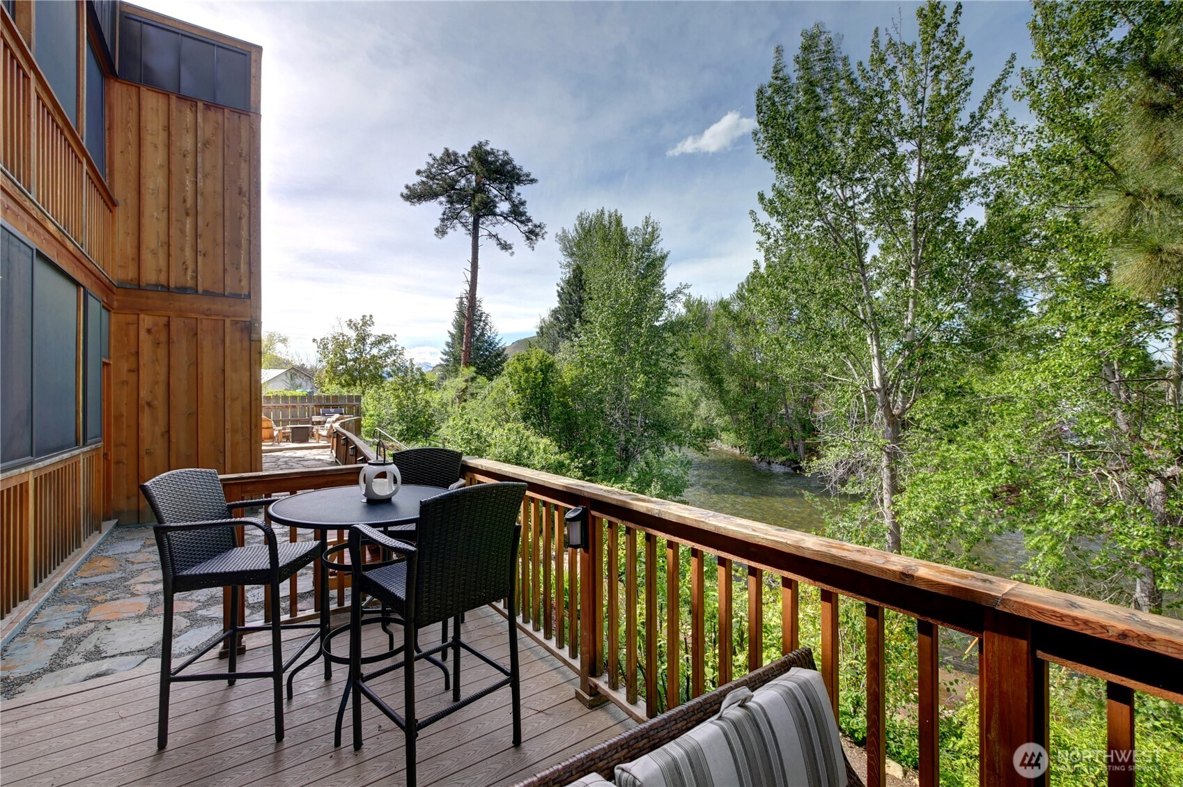140 Twisp Avenue, Unit 204 Twisp, WA 98856 - Photo 9 of 40 a view of a balcony with furniture
