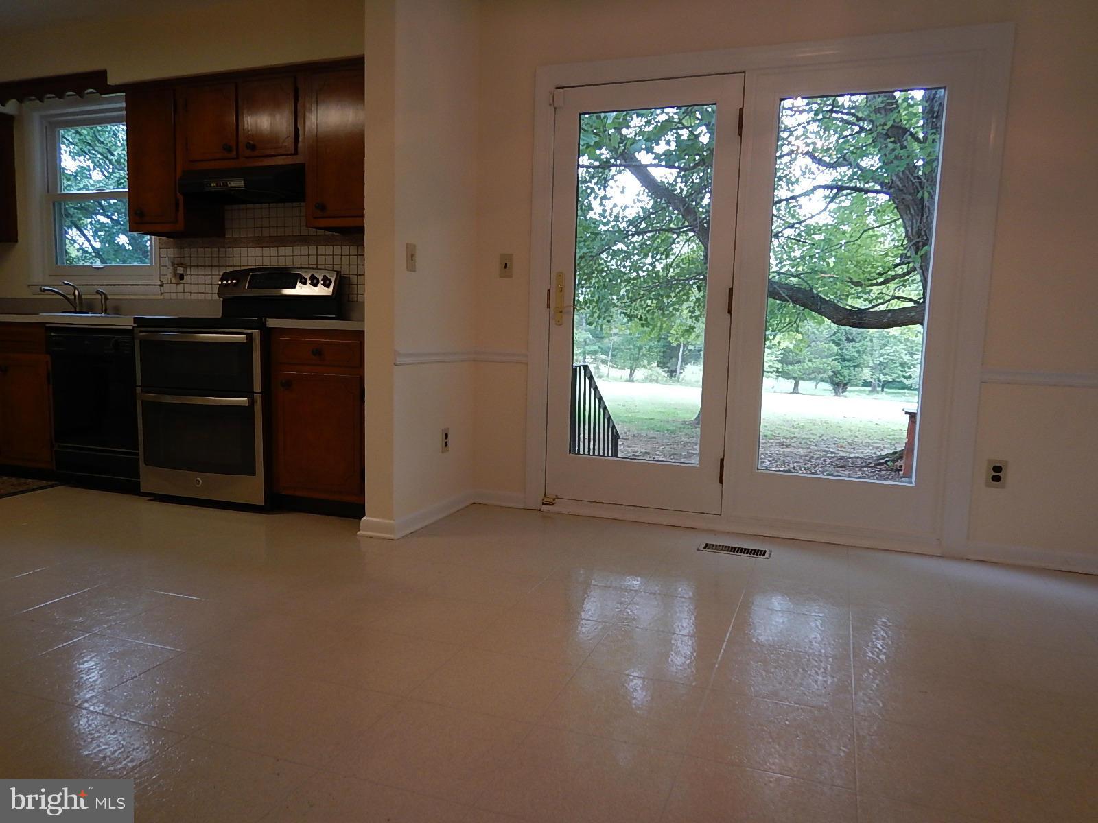 11707 Chapman Road Kingsville, MD 21087 - Photo 17 of 30 Kitchen French Door to Patio
