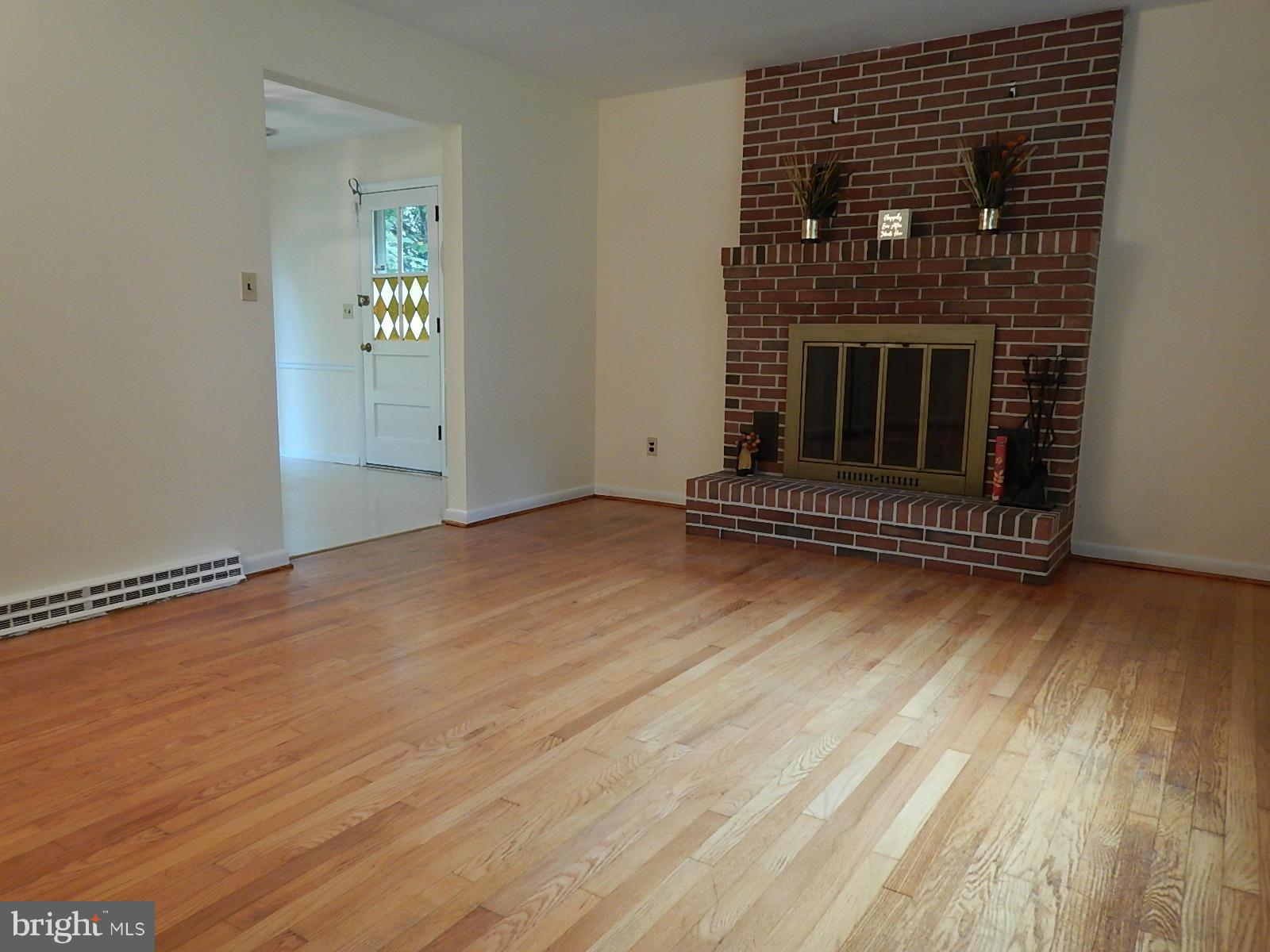 11707 Chapman Road Kingsville, MD 21087 - Photo 20 of 30 Living Room and Fireplace
